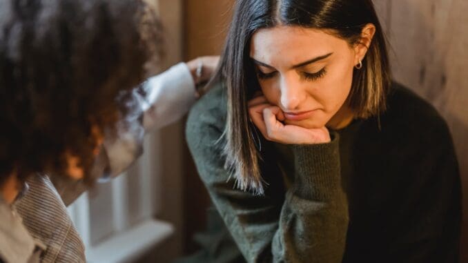 woman struggling with grief in Chicago