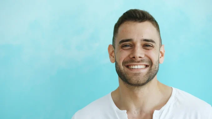 smiling man after positive psychology therapy 2nd Story Counseling Chicago