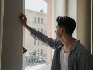 gay man in Chicago reflecting on his inner world through IFS therapy at 2nd Story Counseling