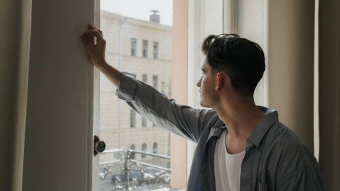 gay man in Chicago reflecting on his inner world through IFS therapy at 2nd Story Counseling