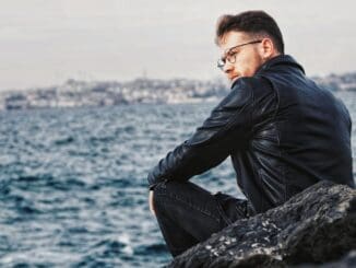 man thinking of going to mens therapy at 2nd Story Counseling Chicago